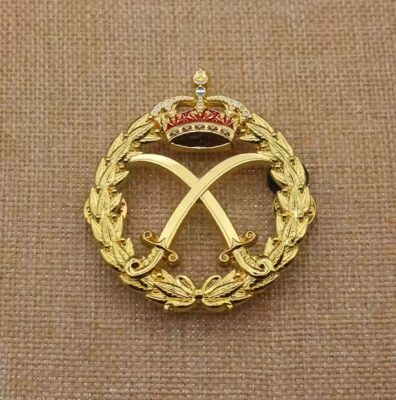 3D embossed custom enamel metal badge with gold finish