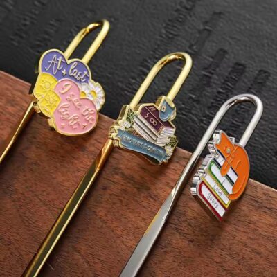 Gold and silver etched metal bookmarks with 3D enamel designs