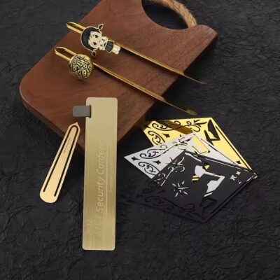 Gold and silver etched metal bookmarks with 3D enamel designs