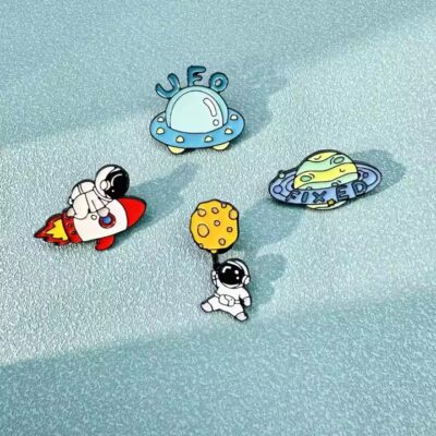 Cartoon Astronaut Enamel Metal Pin – Fun and Colorful Space Design