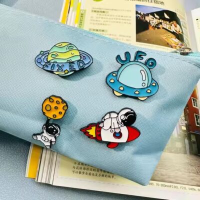 Cartoon Astronaut Enamel Metal Pin – Fun and Colorful Space Design
