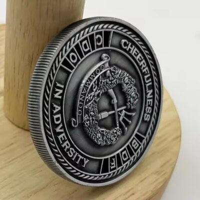 Embossed custom logo challenge coin with detailed 3D finish
