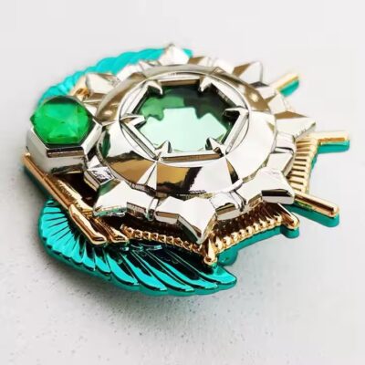 Unique Green Metal Badge with Rhinestone Accents