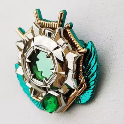 Unique Green Metal Badge with Rhinestone Accents