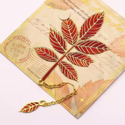 Gold-plated metal butterfly bookmark with colorful enamel design