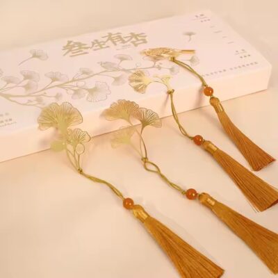 Custom folk art metal bookmark with intricate design