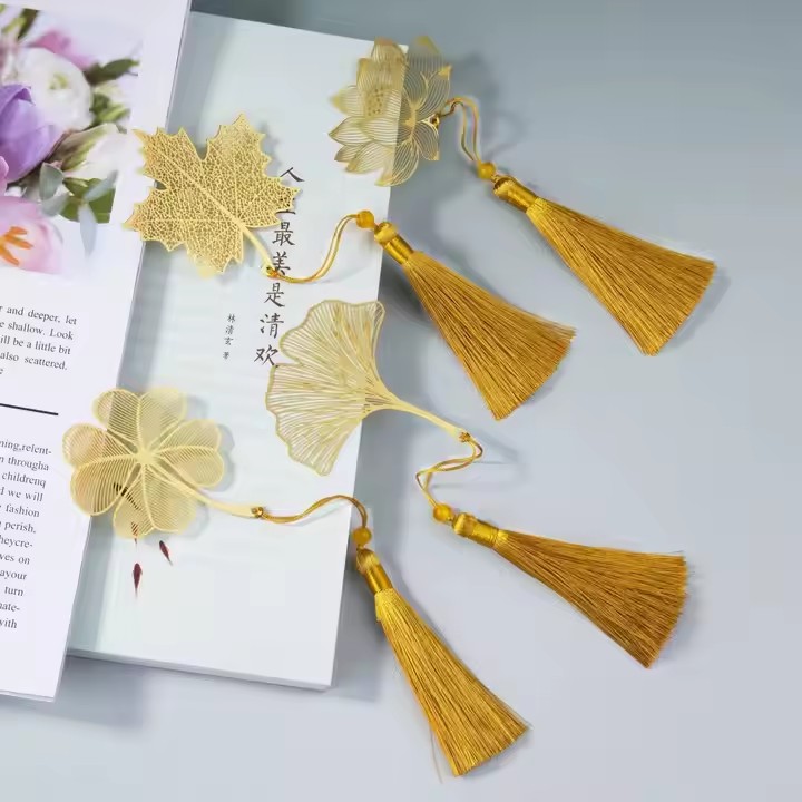 Custom folk art metal bookmark with intricate design