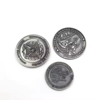 Custom embossed round brass coin with intricate 3D design