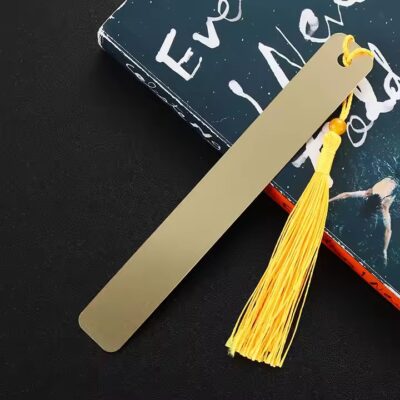 Custom brass metal bookmark with engraved logo design